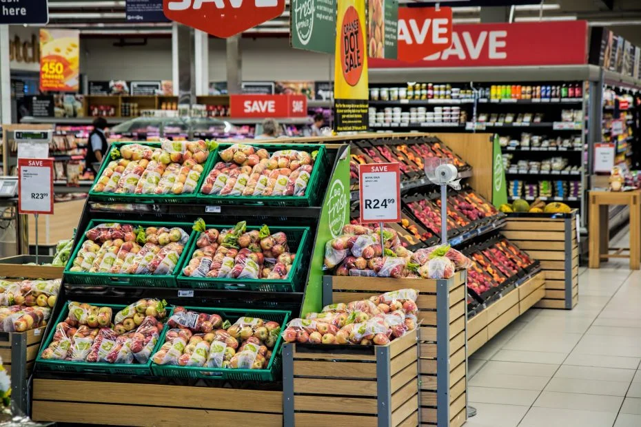 Shelves of fruit inside a grocery store