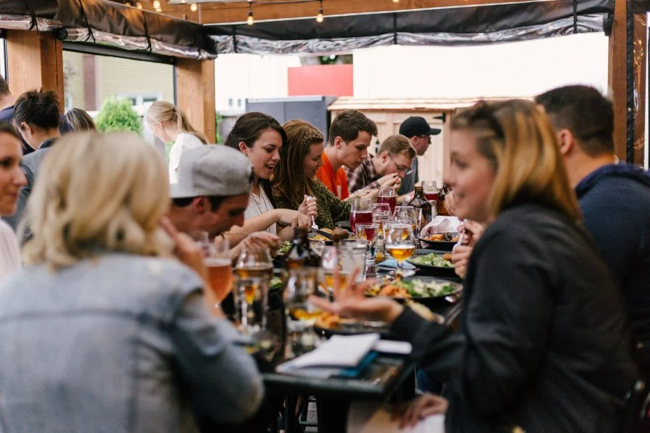 Dinner table with a large group of friends